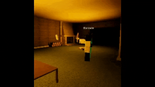 a person is standing in a room with a fireplace and a table .