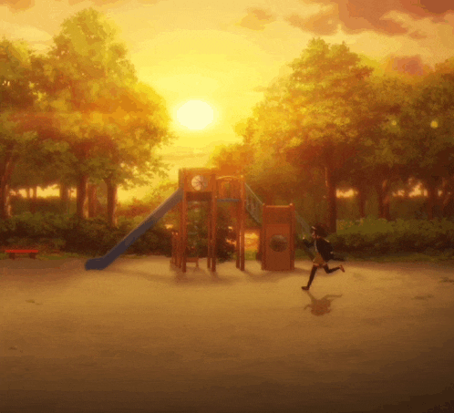 a person running in front of a playground with the sun setting in the background