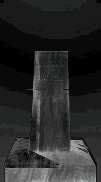 a black and white photo of a statue that says ' h. marzo ' on it