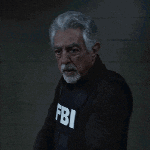 an older man with gray hair and a beard