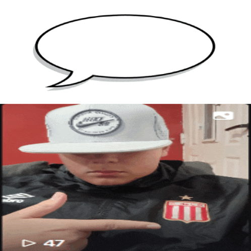 a man wearing a nike hat is pointing at the camera