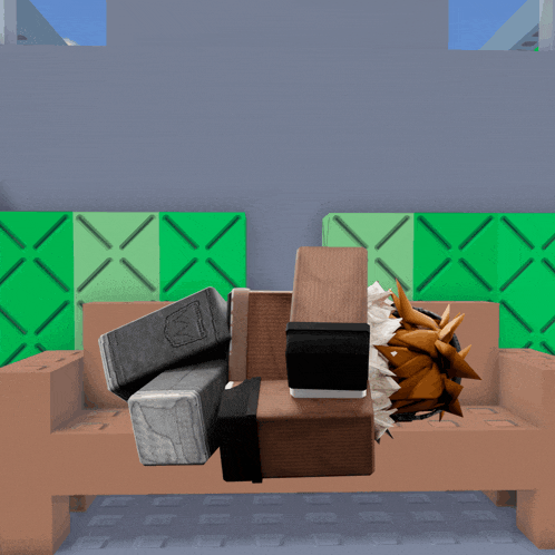 a couch in a video game with the letter m on the arm rest