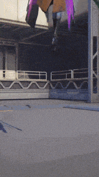a robot with purple wings is flying over a fence