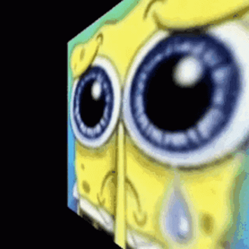 a close up of spongebob squarepants ' eyes with a tear coming out of them