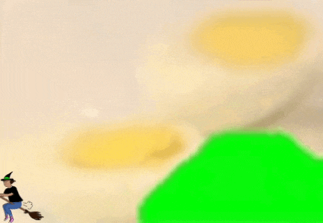 a witch is sitting on a broom next to a green screen .