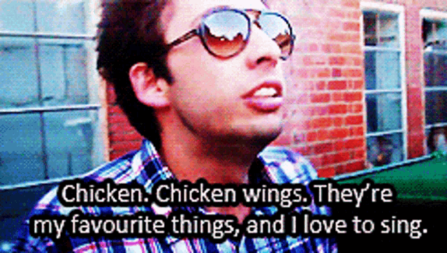 a man wearing sunglasses says chicken chicken wings