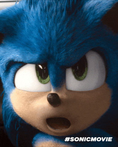 a close up of sonic the hedgehog 's face with #sonicmovie written on the bottom