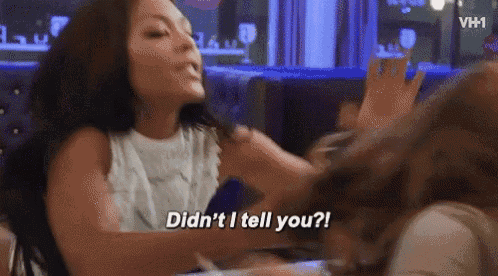 two women are fighting in a restaurant and one of them is saying `` didn 't i tell you ? ''