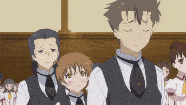 a group of anime characters are standing in a room and one of them has a cross on his head