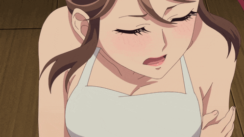 a close up of a woman 's face with a white shirt on