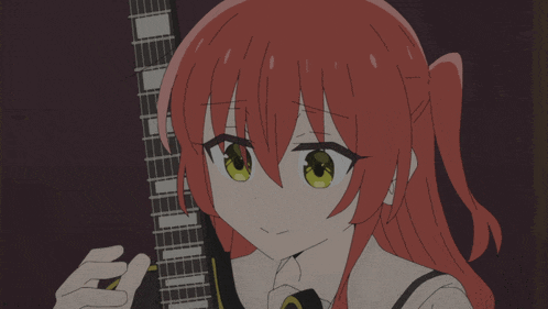 a girl with red hair holds a guitar in her hand