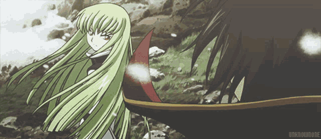 a girl with long green hair stands next to a man with black hair