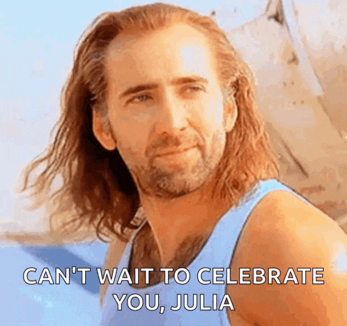 a man with long hair and a beard is smiling and saying `` can 't wait to celebrate you julia ''