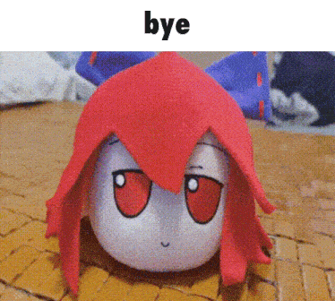 a picture of a stuffed animal with red hair and the words bye above it
