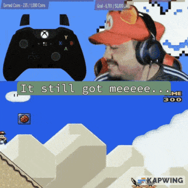 a man wearing headphones is playing a video game and says it still got meeeee ... me 300