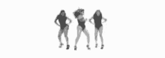 three women in swimsuits are standing next to each other and dancing .