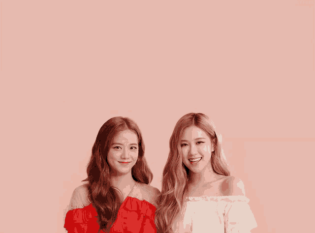 two women are standing next to each other on a pink background with a heart in the background