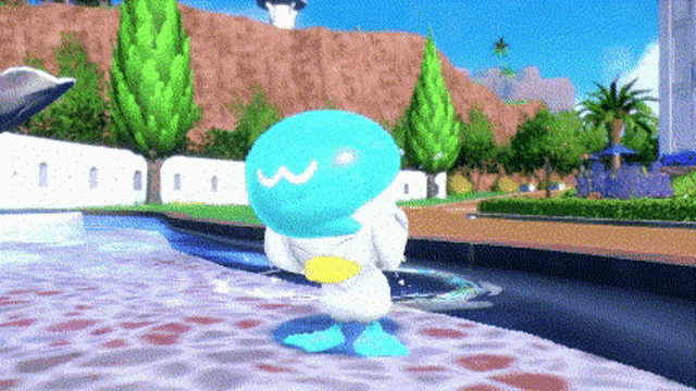 a blue and white cartoon character with a smiling face