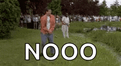 a man in a red jacket is standing in a grassy field with the word nooo written on it .