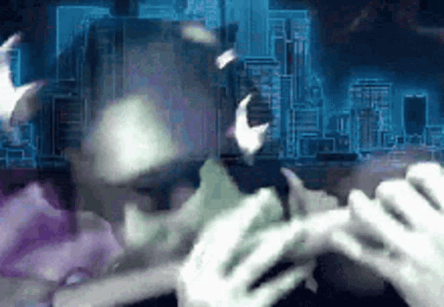 a blurry picture of a person playing a flute in front of a city skyline