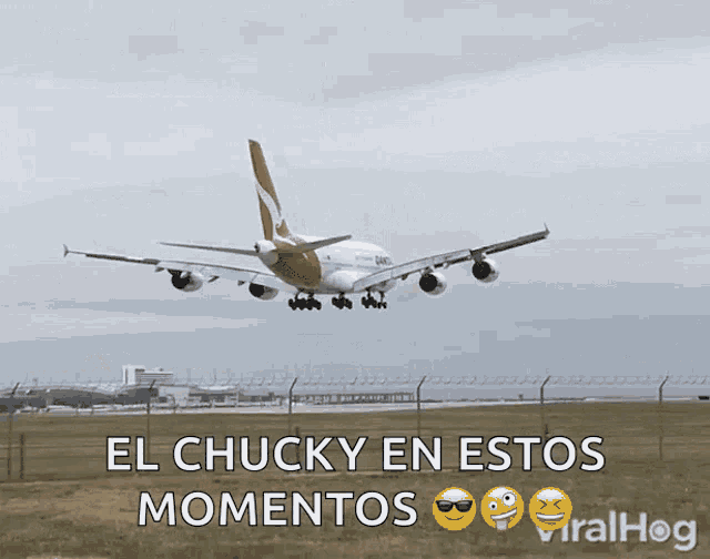 an airplane is flying over a field with the words el chucky en estos momentos