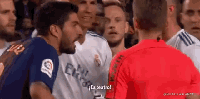 two soccer players are having a fight and one of them is wearing a red shirt that says wurth