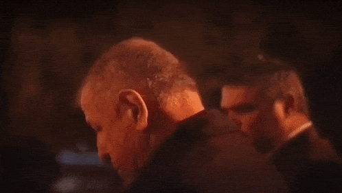 a close up of a man 's face and neck