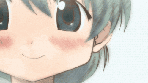 a close up of a girl with blue hair