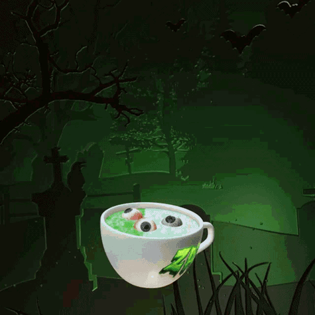 a cup with green liquid and the word zayd on it
