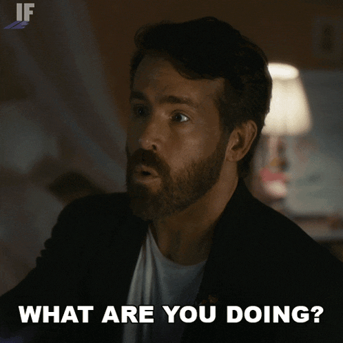 a man with a beard says " what are you doing "