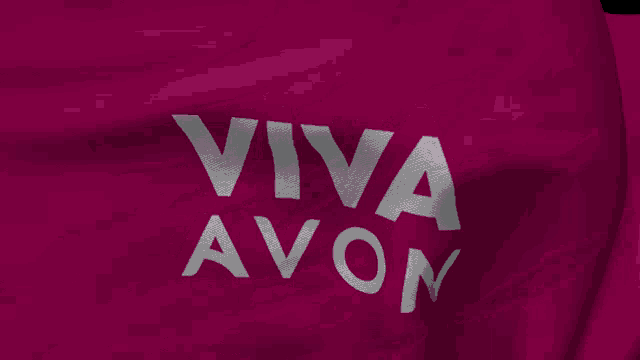 a pink flag that says viva avon in white letters