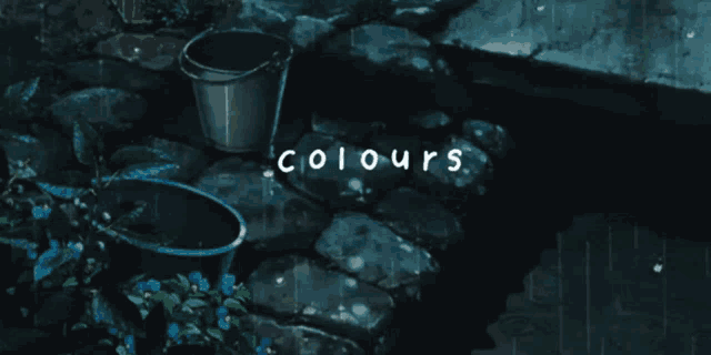a bucket with water pouring out of it with the words colours written above it