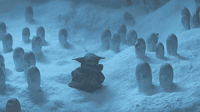 a baby yoda sits in the middle of a snowy field surrounded by aliens