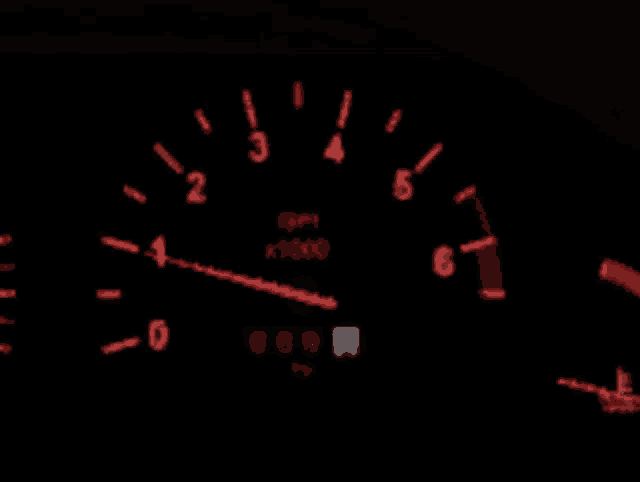 a close up of a tachometer that says rpm on it
