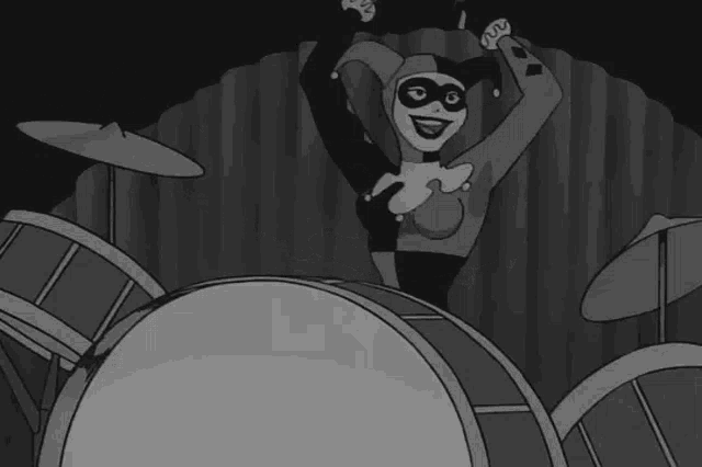 harley quinn is playing drums in a black and white photo .