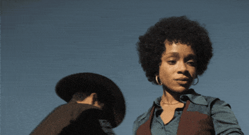 a man and a woman standing next to each other