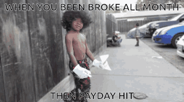 a shirtless child is holding a piece of paper with the caption " when you been broke all month then payday hit " on the bottom