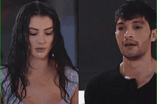 a man and a woman are standing next to each other and the man is smiling
