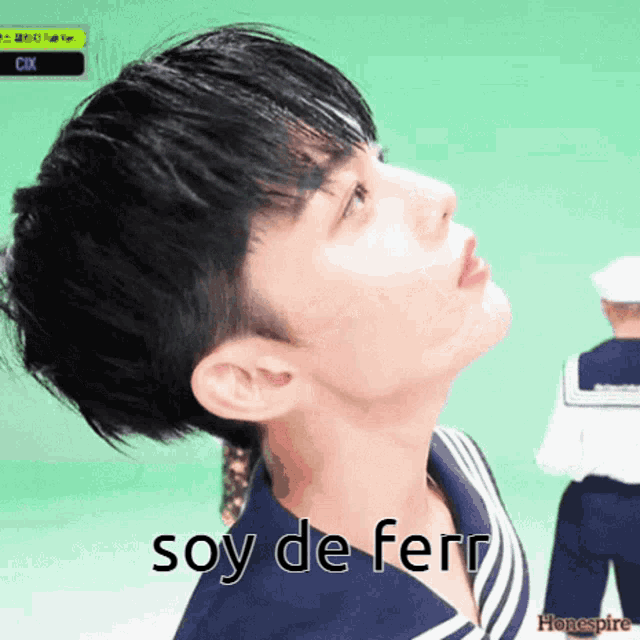 a close up of a person 's face with the words soy de ferri written below it