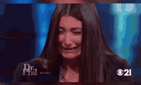 a woman is crying on a tv show called dr phil