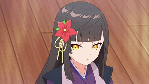 a girl with a red flower in her hair