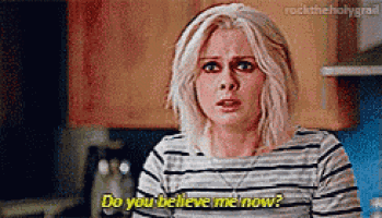 a woman in a striped shirt is asking , `` do you believe me now '' .