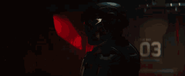 a close up of a person 's arm in a dark room