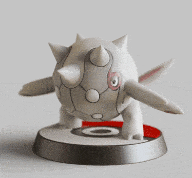 a statue of a pokemon named cetitan on a red base