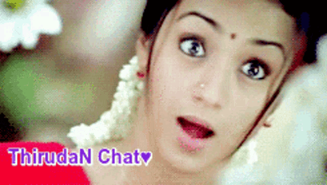 a close up of a woman 's face with the words " thirudan chat " below it