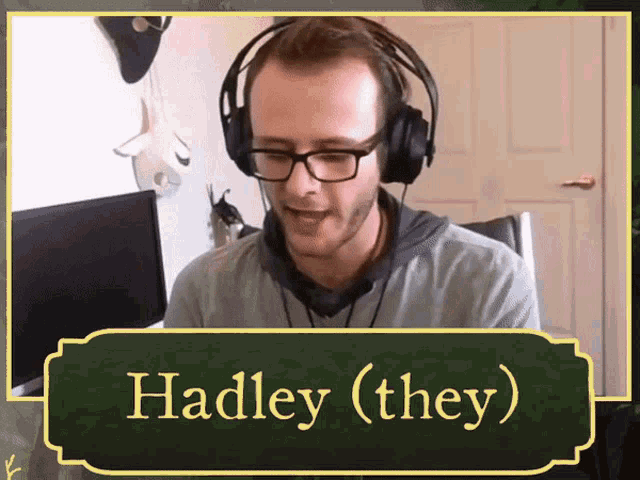 a man wearing headphones and glasses is named hadley