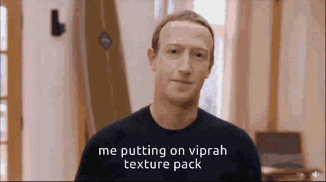 a man wearing a black shirt with the words me putting on viprah texture pack