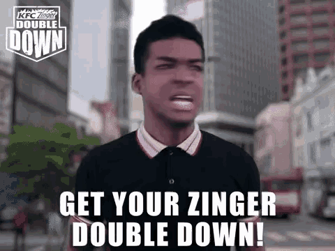 a man is making a funny face and says get your zinger double down !