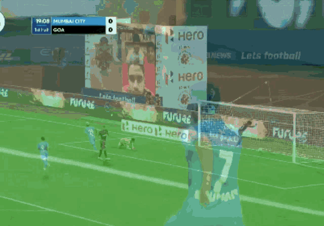 a man in a blue jersey with the number 7 on it stands on a soccer field