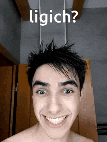 a shirtless young man with a huge smile on his face and the words ligich behind him